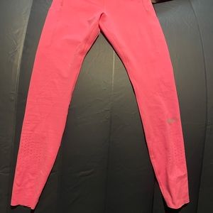 Brand new with tags. Nike dri fit athletic leggings with pockets.